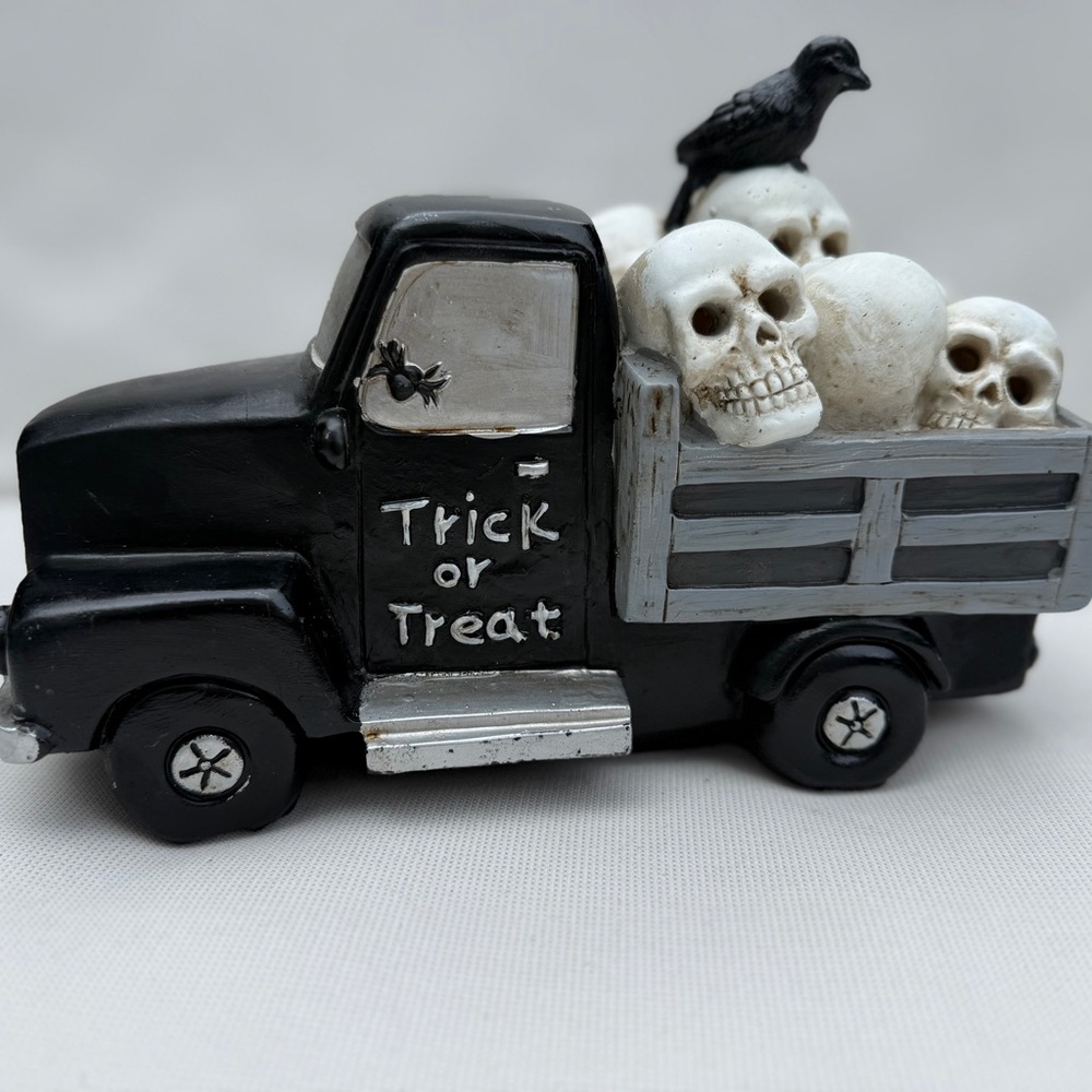 Black Halloween Truck with Skulls and Crow